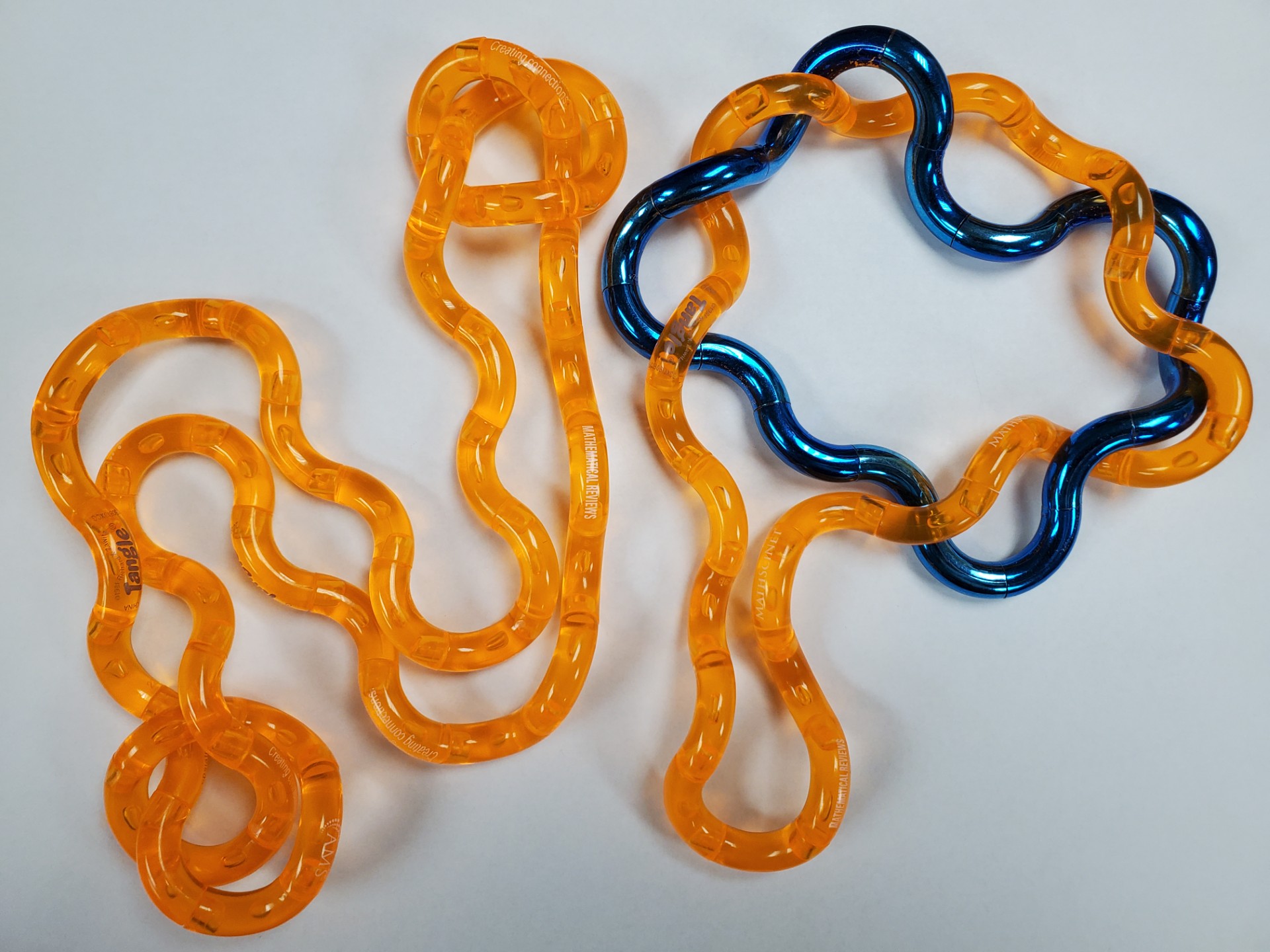 Picture of a 3D Knot spelling out 'NP'