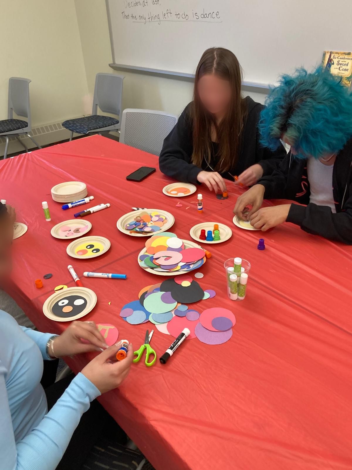 Peole crafting with paper circles